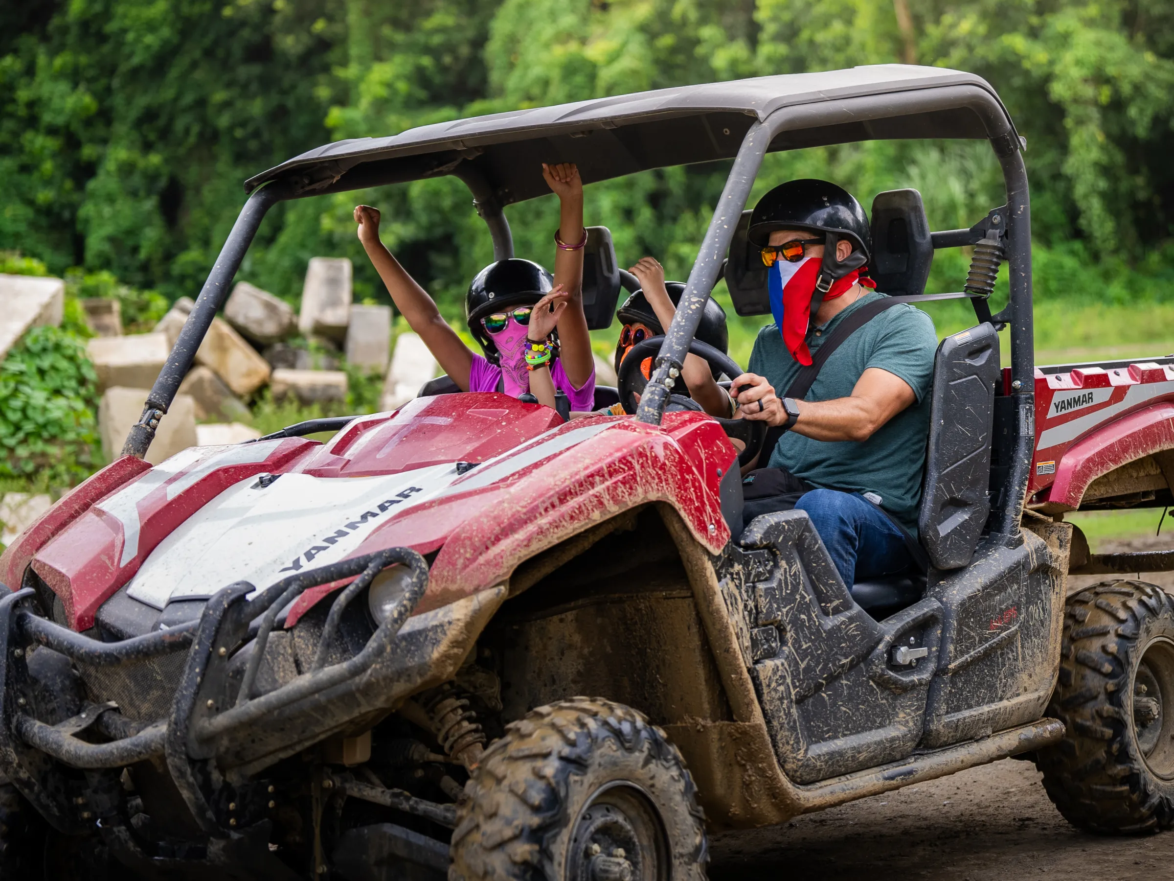 a person riding on the back of a truck