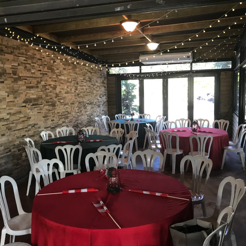 Tables & chairs setup inside bar and grill
